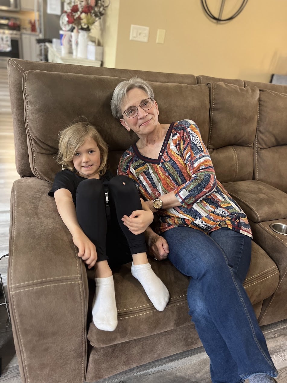 Elizabeth with her grandson at home